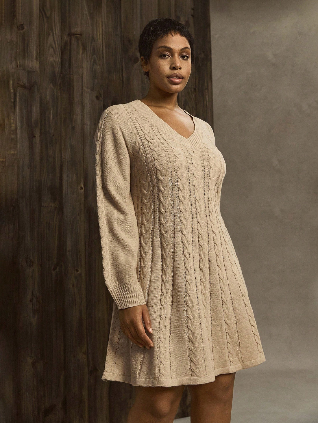 Embrace cozy charm with this chic plus size solid color knit dress, perfect for autumn and winter days. Its soft, stretchy fabric keeps you comfortable while flattering your curves effortlessly. Whether you're out for a casual stroll or sipping hot cocoa by the fire, this dress adds a playful touch to your seasonal wardrobe. Stay warm, stylish, and confidently you!