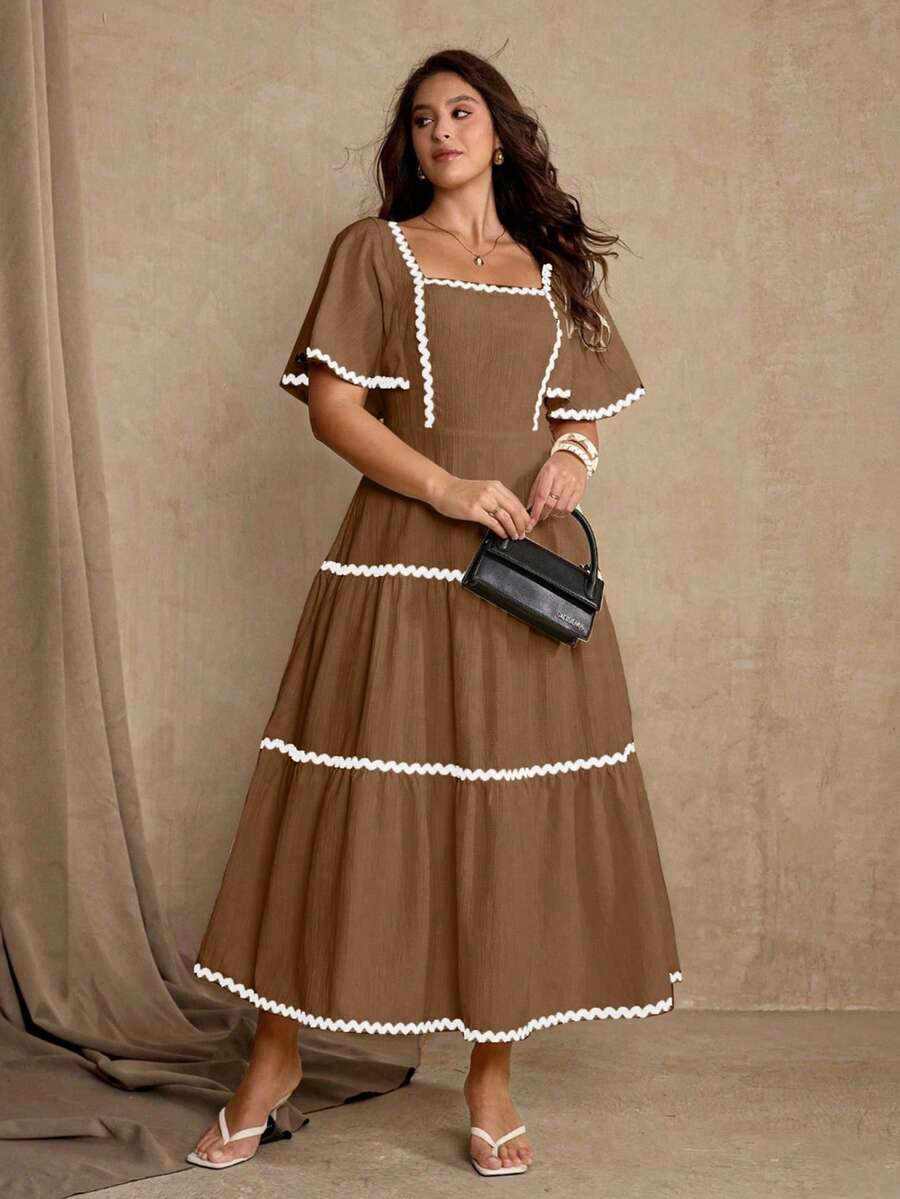 Refresh your warm-weather wardrobe with this chic plus size summer dress, designed with playful patchwork details and a feminine ruffle hem for an effortlessly stylish look. The relaxed silhouette offers comfortable movement while creating an easy, flattering fit for a variety of body shapes. Lightweight and easy to wear, this dress is perfect for casual weekends, brunch dates, beach vacations, shopping trips, garden gatherings, and laid-back summer outings. 