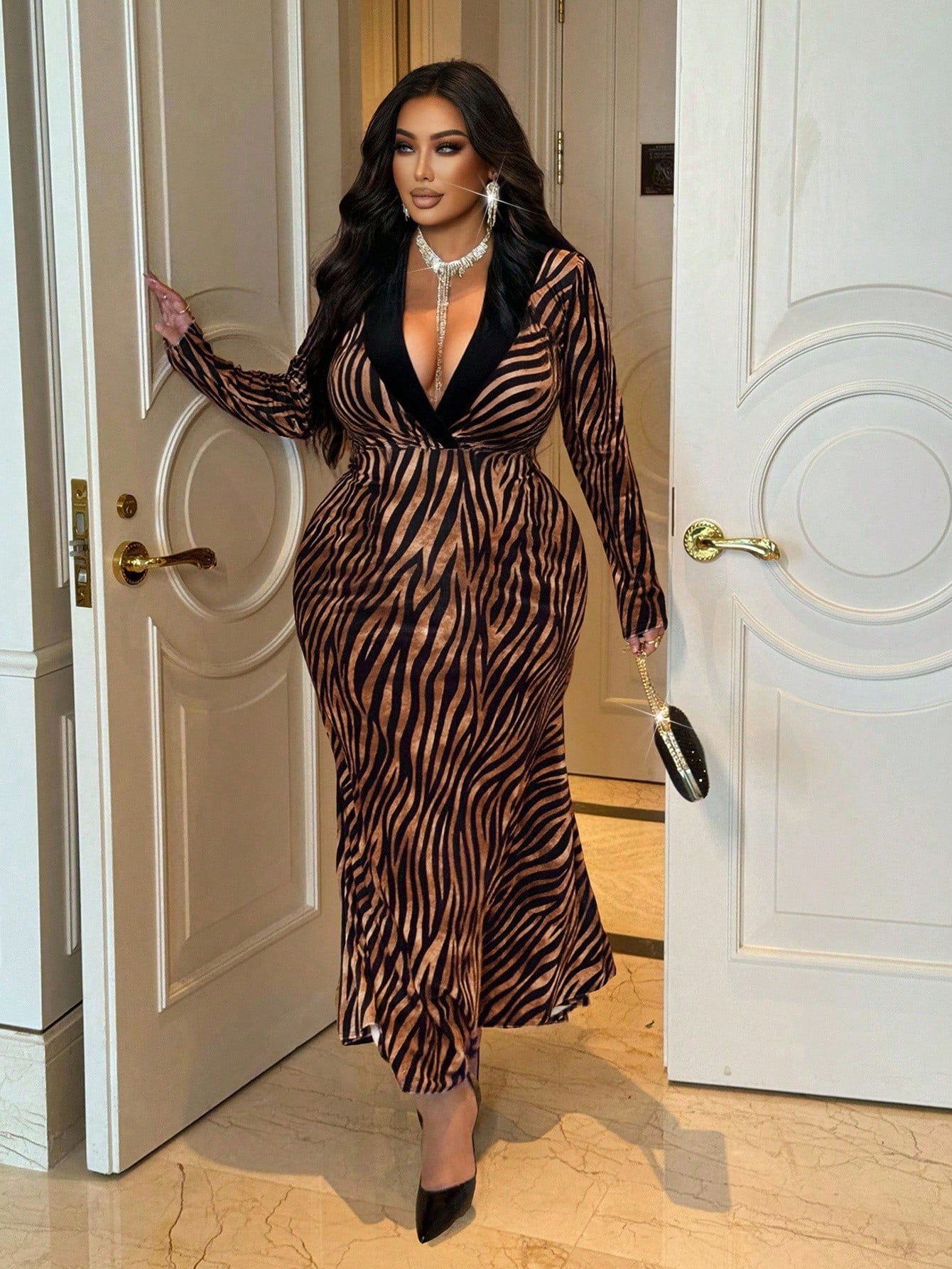 Step into cozy glamour with this Chic Plus Size Velvet Zebra Print Maxi Dress, perfect for autumn and winter parties. The soft velvet fabric keeps you warm while the bold zebra print adds a wild twist to your look. Flowing maxi length offers both comfort and drama, making every move feel effortlessly stylish. Embrace the season’s festivities with a dress that’s as playful as it is flattering!