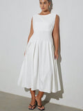 Turn heads effortlessly in this chic plus size white sleeveless dress, featuring a stylish one-shoulder hem that adds a flirty twist. The pleated patchwork detail brings texture and movement, making every step feel like a dance. Perfect for sunny days or evening fun, this dress combines comfort with playful elegance.