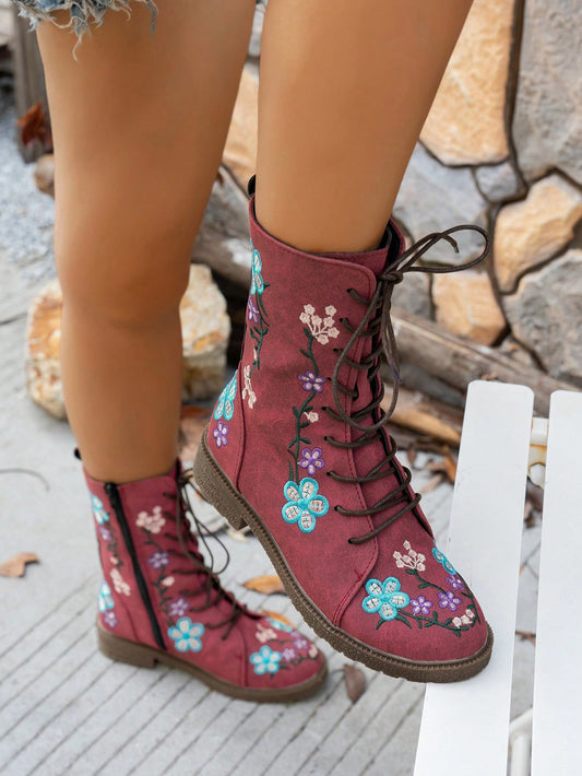 Expertly designed for plus size women, these chic western-style booties are made with high-quality embroidered suede and a stylish square heel. Elevate any outfit with these boots that provide both fashion and comfort. Perfect for any occasion, these booties are a must-have for any modern wardrobe.