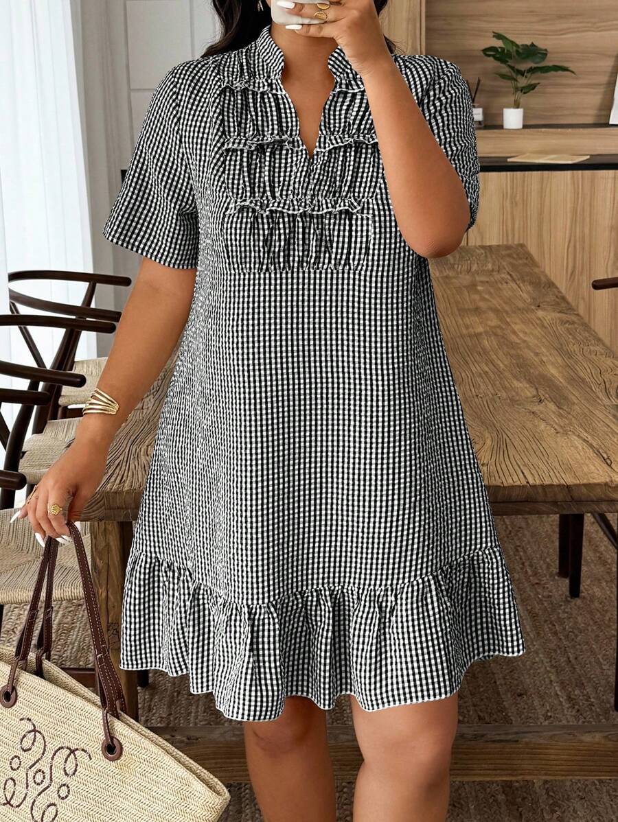 Elevate your wardrobe with this fabulous plaid ruffle dress that's all about celebrating your curves with confidence! The charming plaid pattern pairs perfectly with delicate ruffles that add movement and dimension to every step. Designed for the modern woman who refuses to compromise on style, this dress transitions seamlessly from casual brunch to evening plans. The textured details catch the light beautifully, while the thoughtful cut ensures a flattering fit that makes you feel amazing. Whether you're d