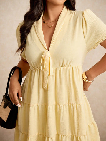 Brighten your summer wardrobe with this Chic Plus Size Yellow Doll Dress, designed to bring joy and comfort. Featuring a charming collar and an adorable bowknot, this playful dress embraces your curves with a flattering fit. Its cheerful yellow hue and breezy fabric make it an ideal choice for sunny days, parties, or casual outings. Step out with confidence and a splash of sunshine!