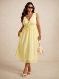 Brighten your summer getaways with this playful plus size yellow midi dress. Its flowy, sleeveless design and flattering V-neckline create a breezy, comfortable look that moves with you. The A-line silhouette adds a touch of effortless elegance, perfect for sunny days and warm evenings. Embrace effortless style and feel fantastic wherever your vacation takes you!
