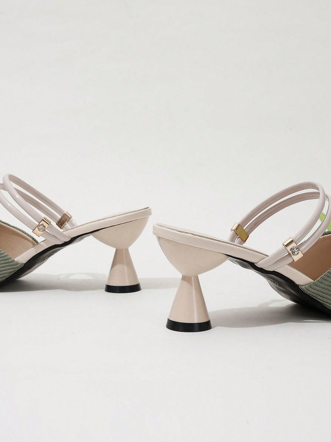 Slip into style with our Chic Pointed-Toe Two-Way Half Slippers! These versatile heels are perfect for spring and autumn, with a pointed-toe design and high heels for a chic touch. Whether you wear them as mules or with the back strap, these slippers will elevate any outfit.