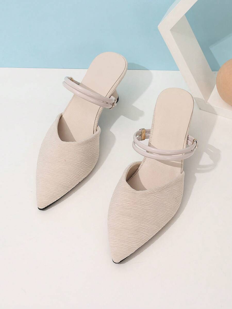 Step into style with these Chic Pointed Toe High Heeled Mules, perfect for spring and autumn adventures. Their sleek pointed design adds a touch of elegance, while the versatile two-way slipper feature lets you switch up your look with ease. Whether you're dressing up or keeping it casual, these mules bring playful flair and refined comfort to every step you take.