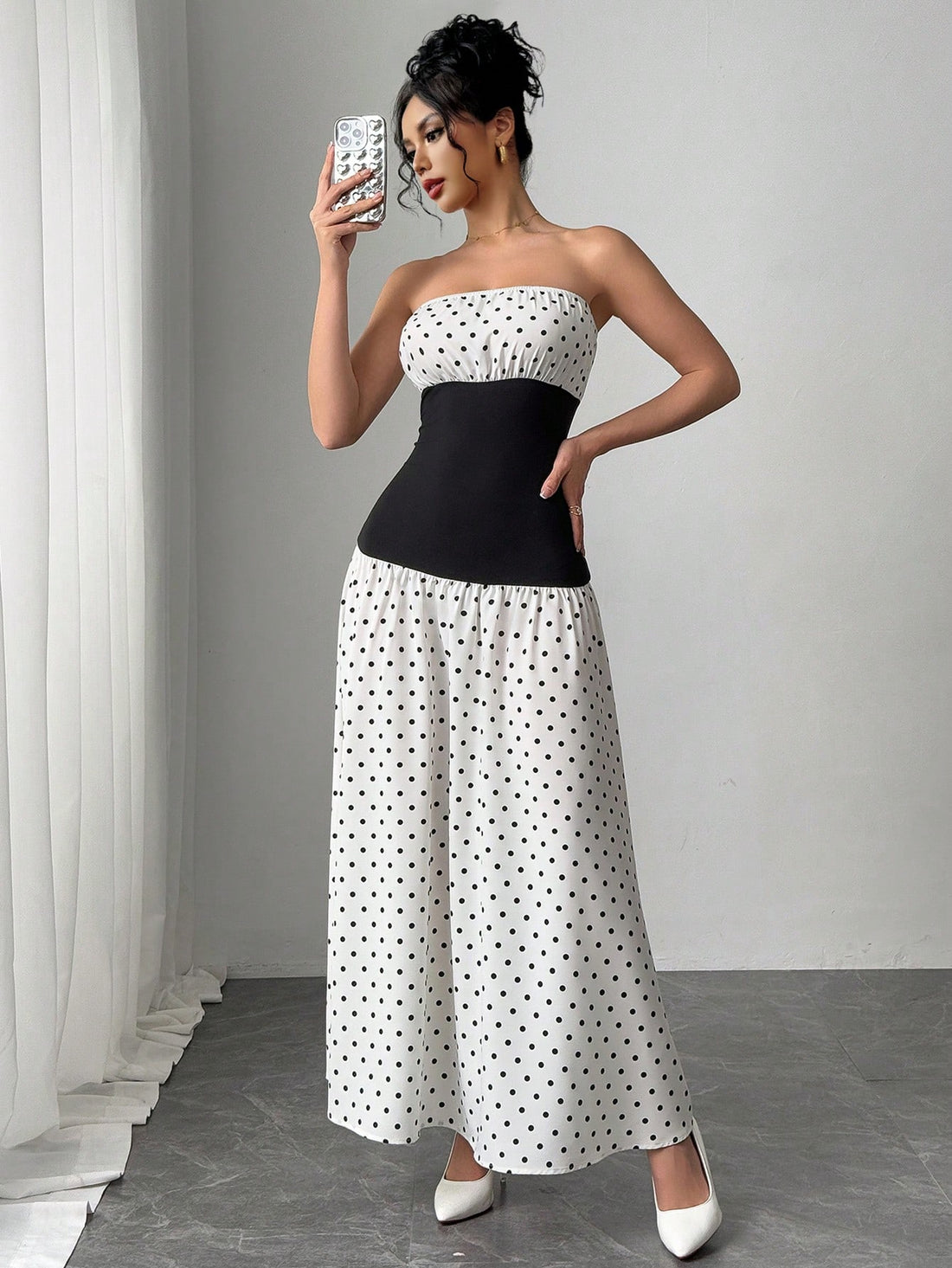 Unleash your effortless elegance with our Chic Polka Dot Bandeau Dress! Perfect for any occasion, this dress will make you stand out in style. With its playful polka dot pattern and versatile design, you'll exude confidence and charm wherever you go. Get ready to turn heads and make a statement!