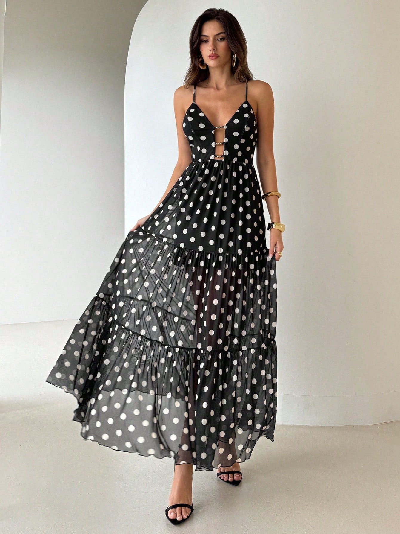 Step out in style with the Chic Polka Dot Cami Long Dress, your go-to choice for graduation and teacher events. Its playful polka dot pattern and flowing silhouette offer a fun yet elegant vibe, making every moment feel special. Lightweight and comfortable, this dress keeps you looking effortlessly chic all day long. Perfect for stylish women who love to blend charm with confidence!