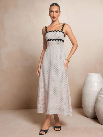 Step into playful elegance with this Chic Polka Dot Contrast Wave Tape Slip Long Dress. Its flowing silhouette and bold polka dot pattern create a fun, flirty vibe, while the wave tape contrast adds a unique touch that sets you apart. Perfect for effortless style, this dress moves with you, making every moment feel light and lively. Whether out for brunch or dancing the night away, it’s a joyful wardrobe must-have.