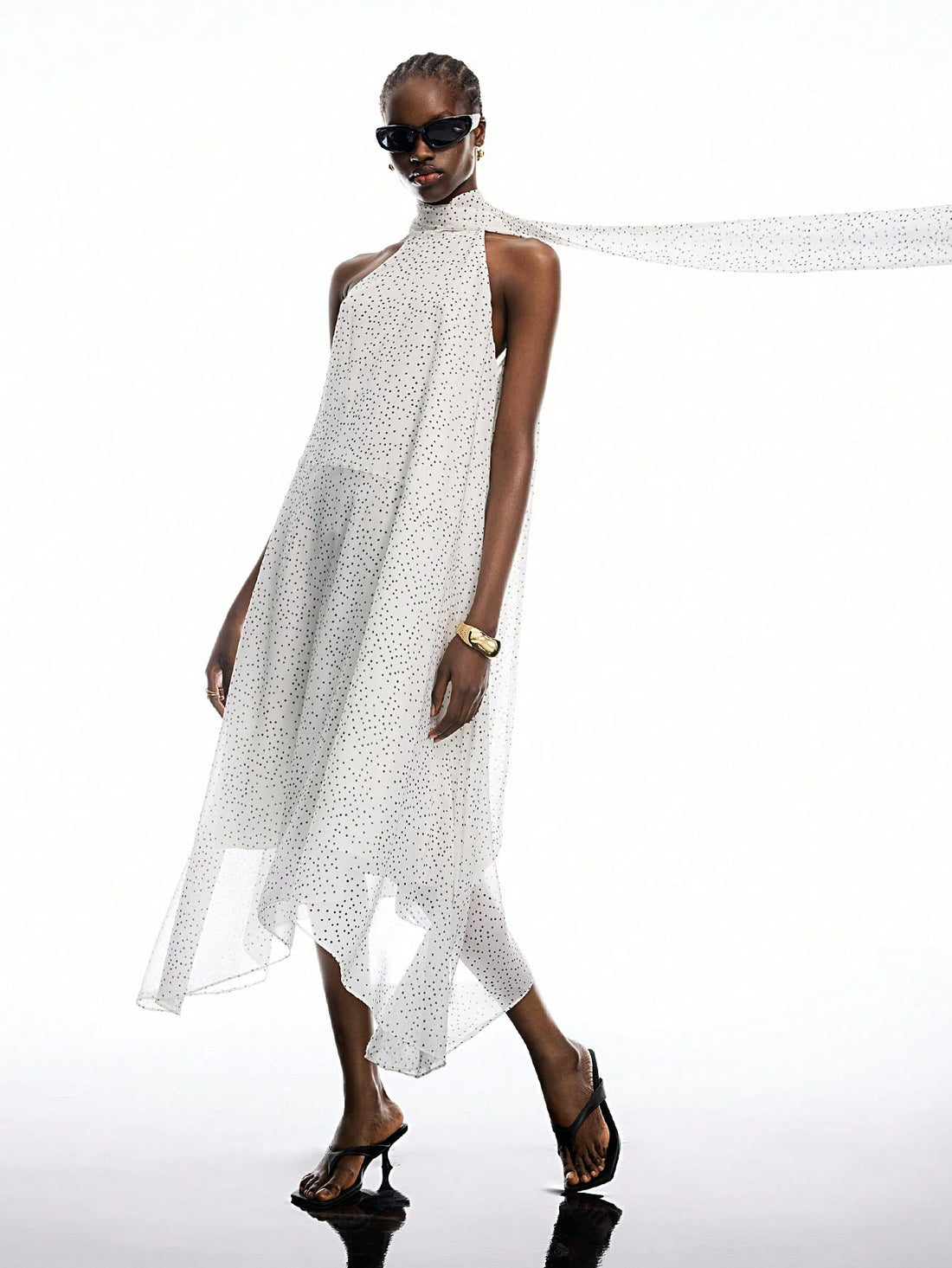 Step out in style with this playful polka dot mid-length dress, designed to bring charm to any occasion. Its flattering cut and breezy fabric make it perfect for casual outings or spontaneous adventures. Embrace effortless elegance and let your fun side shine through every twirl.