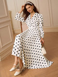Step out in playful charm with this chic polka dot dress, featuring a flattering mid-length cut and a cinched waist that highlights your silhouette. Perfect for effortless style, it pairs classic patterns with a modern fit to keep you looking fabulous from brunch to evening strolls.