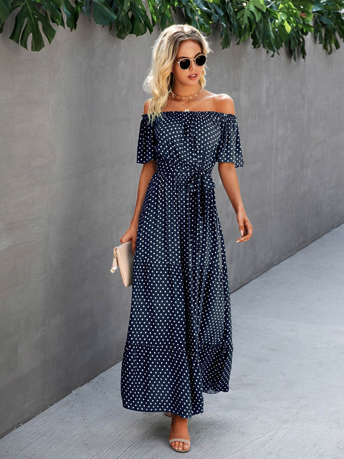 Look effortlessly elegant in this Chic Polka Dot Off-the-Shoulder Belted Dress. The off-the-shoulder design and polka dot print add a touch of chicness, while the belted waistline accentuates your figure. Perfect for any occasion, this dress exudes sophistication and style.