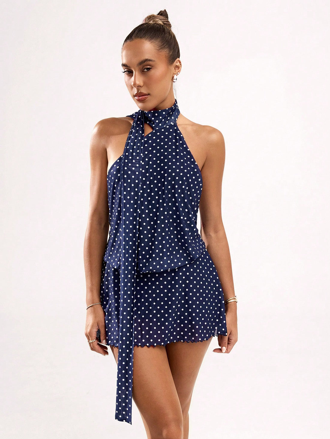 Be the life of the tea party with our Chic Polka Dot Print Backless Summer Dress! This sleeveless dress is perfect for casual outings, with its fun and playful polka dot print. Show off your style and let the compliments roll in.