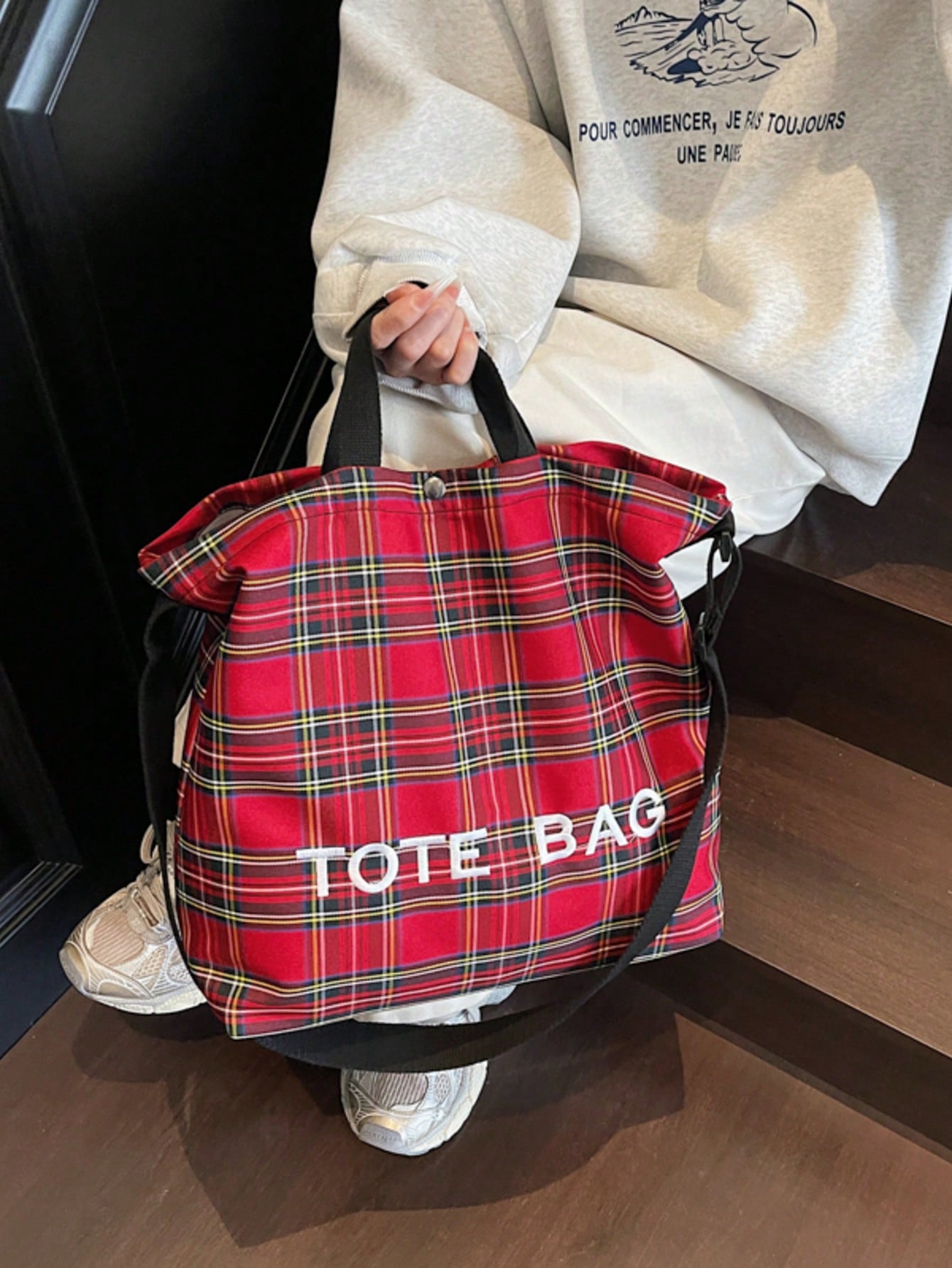 This stylish large capacity tote blends playful charm with practical design. Crafted from lightweight PVC and Kraft paper, it’s easy to carry yet durable enough for all your essentials. The magic tape closure adds a fun twist—snap it shut or open it up in seconds. Perfect for busy days, this chic preppy tote keeps you looking fresh while holding everything you need.