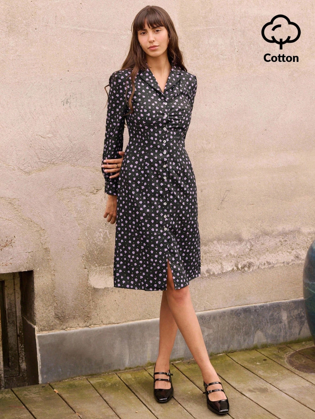 Elevate your workweek wardrobe with this charming purple ditsy floral midi shirt dress—a versatile piece that effortlessly transitions from office to weekend plans. The classic shirt dress silhouette pairs perfectly with blazers for polished meetings or stands beautifully on its own for a more relaxed vibe. Delicate floral prints add personality without overwhelming your look, while the midi length keeps things professional and on-trend. Whether you're layering it over a turtleneck for chilly mornings or pa