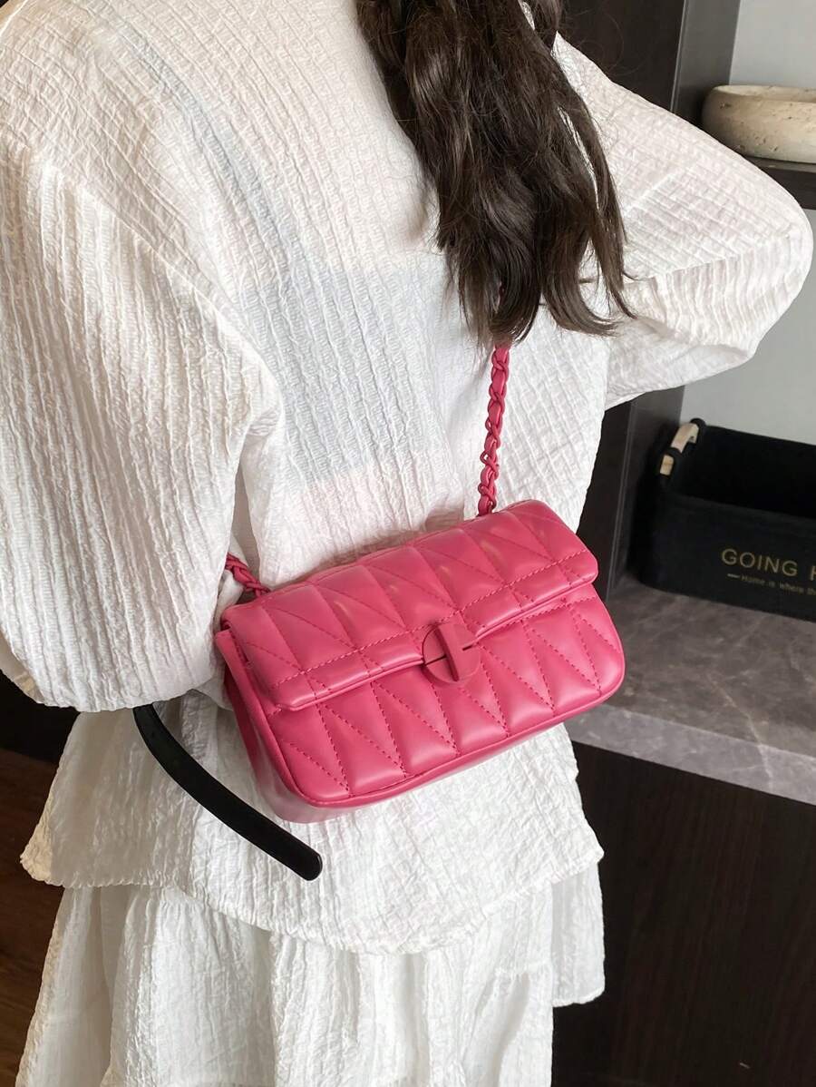 Add a dash of charm to your look with this Chic Quilted Chevron Crossbody Bag! Its playful quilted chevron pattern adds stylish texture, while the secure twist lock keeps your essentials safe on the go. Perfectly sized and effortlessly cool, this bag turns any outfit into a fun fashion statement.
