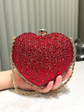 Elevate your style with our Chic Red Heart-Shaped Rhinestone Evening Clutch Bag. This stunning bag features a metal chain strap and intricate rhinestone detailing, perfect for adding a touch of glamour to any occasion. Whether it's a banquet, wedding, or formal event, this bag will make a statement and complement any outfit. Don't miss out on this must-have accessory!