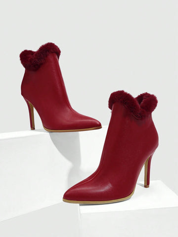Elevate your style with our Chic Red High Heel Ankle Boots with Faux Fur Accents! The bold red color and faux fur accents will add a touch of luxury to any outfit. Step out in confidence and make a statement with these chic and fashion-forward boots. Perfect for any occasion, these boots will keep you looking and feeling your best!