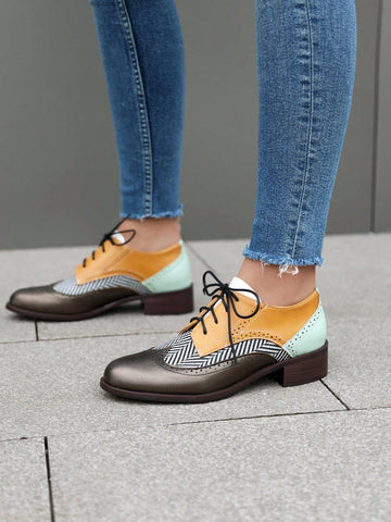 Elevate your style with our Chic Retro British Flat Oxford Shoes. Featuring a chunky heel and color block design, these shoes are perfect for any occasion. With a touch of British flair, these shoes exude sophistication and add a unique touch to your wardrobe. Step into comfort and style with our retro oxfords.