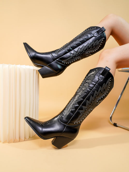 These chic retro cowboy boots feature a sleek stiletto heel and intricate embroidered detailing. With a touch of vintage charm and modern flair, they are perfect for making a statement. Crafted with quality materials and expert craftsmanship, these boots are a must-have for any fashion-forward individual.