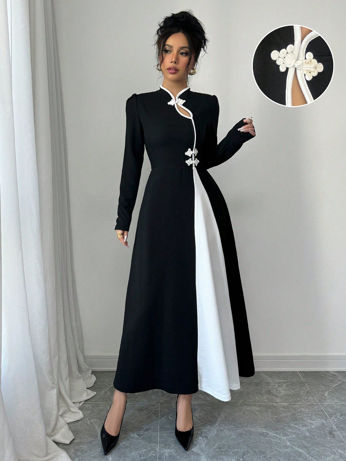 Unleash your inner fashionista with this Chic Retro Elegance maxi dress! Featuring a unique black and white patchwork design, this dress is perfect for making a statement. The playful bubble sleeves add a touch of whimsy to this elegant piece. Step out in style and turn heads with this must-have dress.