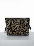 Elevate your everyday style with this chic retro leopard print tote bag. Crafted from luxurious 100% viscose, this medium-sized shoulder bag features eye-catching spiked details and a textured pattern that adds visual interest. The double handles make it perfect for daily commutes, shopping trips, and fall fashion moments. Its spacious interior accommodates all your essentials, while the no-closure design offers quick, easy access. Whether you're heading to work or weekend adventures, this versatile black t