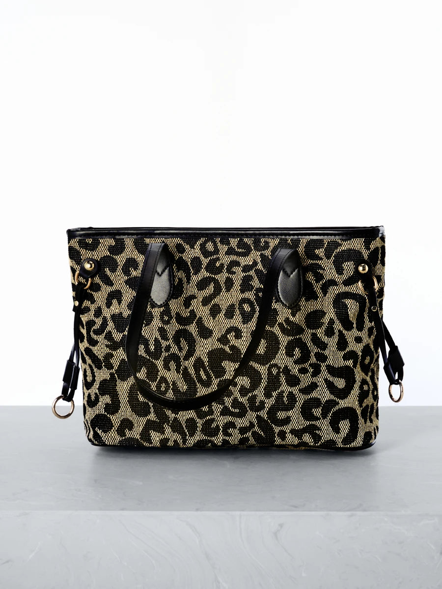 Elevate your everyday style with this chic retro leopard print tote bag. Crafted from luxurious 100% viscose, this medium-sized shoulder bag features eye-catching spiked details and a textured pattern that adds visual interest. The double handles make it perfect for daily commutes, shopping trips, and fall fashion moments. Its spacious interior accommodates all your essentials, while the no-closure design offers quick, easy access. Whether you're heading to work or weekend adventures, this versatile black t