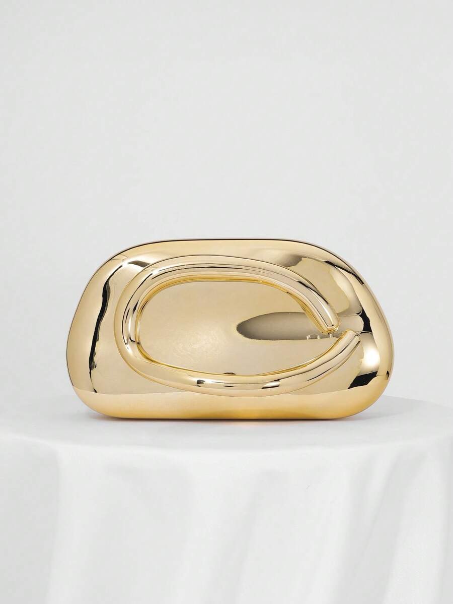 Add a splash of vintage charm to your night out with this Chic Retro Metal Decor Box Clutch. Perfectly sized for your essentials, its sleek metal design shines under party lights, making it the ultimate companion for cocktails and celebrations. Carry your style with a wink and a nod to retro elegance!