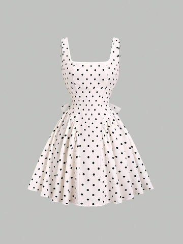 Step out in style with this Chic Retro Polka Dot Mini Dress, featuring a flattering V-neck and a playful back cutout that adds a flirty twist. Its timeless polka dot pattern brings classic American flair to your wardrobe, perfect for sunny days or lively nights. Lightweight and fun, this dress effortlessly combines vintage charm with modern sass.