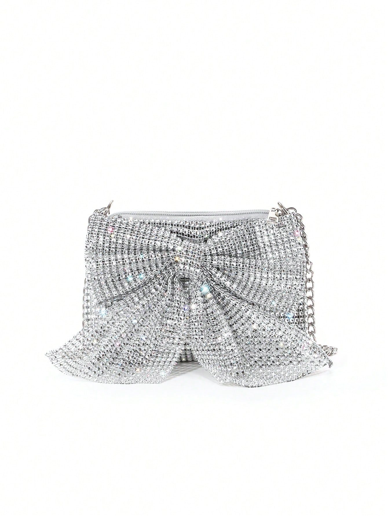 Get ready to turn heads with our Chic Rhinestone Bowknot One-Shoulder Clutch! Perfect for gala, prom, and cocktail events, this stunning clutch features a sparkling rhinestone bowknot and a comfortable one-shoulder strap. Make a statement and add a touch of elegance to any outfit with this must-have accessory.