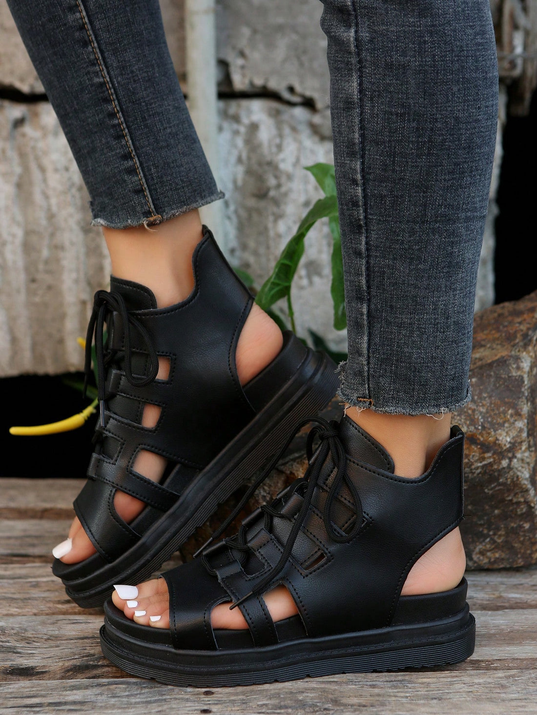 Step up your summer style with our Chic Roman Style Platform Sandals. These sandals feature a sleek and stylish design that will elevate any summer outfit. With a comfortable platform and trendy Roman-inspired straps, these sandals are the perfect addition to your wardrobe. Whether you're heading to the beach or a night out, these sandals will take your style to the next level.