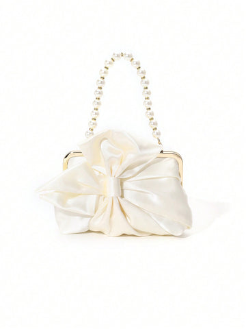 Elevate your style with Chic Romance: Elegant Satin Bowknot Pearls Clutch Bag. Perfect for special occasions, its satin material, sophisticated bowknot design, and delicate pearls add a touch of elegance. Make a statement and stand out with this must-have accessory.