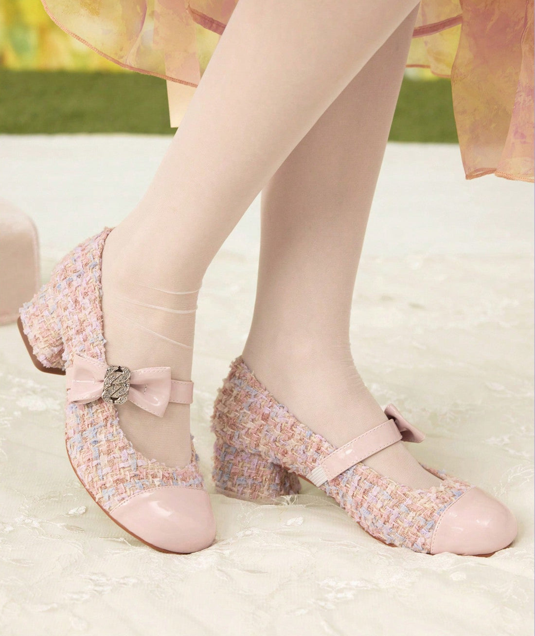 Step out in style with these chic high heels featuring a playful round toe and a charming bowknot strap. The thick heel offers both flair and stability, making them perfect for dancing the night away or turning heads at any event. Designed for stylish women who love a fun twist on classic elegance.