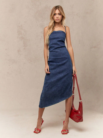 Effortlessly slay in this Chic Ruched Denim Midi Dress, complete with Spaghetti Straps and an Asymmetric Hem for a stylish twist. Perfect for any occasion, this dress will give you the effortless style you crave. (Get ready to turn heads!)