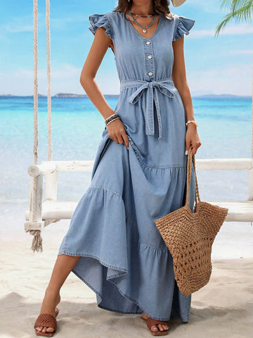 This chic denim dress features a flattering ruffle-trim and a stylish belt, making it the perfect piece for effortless style. Its versatile design allows for comfort and elegance, making it a must-have for any wardrobe. Elevate your fashion game with this essential dress.