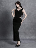 Full front view of black draped bodycon midi dress with asymmetric waist cutout