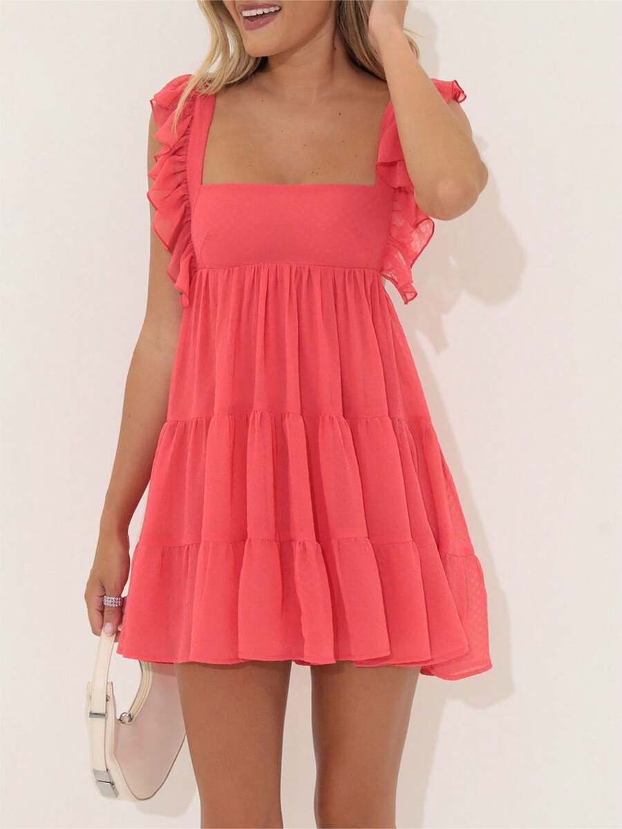 Flaunt your style in this playful Chic Ruffle Strap Mini Dress. With its unique ruffle straps and square neckline, this sleeveless dress is perfect for summer. Available in a variety of solid colors, it's a must-have for any fashion-forward wardrobe. (And yes, it's as cute as it sounds!)