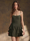 Step into summer with this playful ruffle tiered mini dress, designed to keep you cool and stylish. Featuring delicate spaghetti straps and a trendy cut-out detail, it’s perfect for sunny days and fun nights out. The lightweight fabric and flirty tiers add movement and charm, making every step feel like a breeze. Embrace effortless summer vibes with this chic, sleeveless dress made for endless fun.