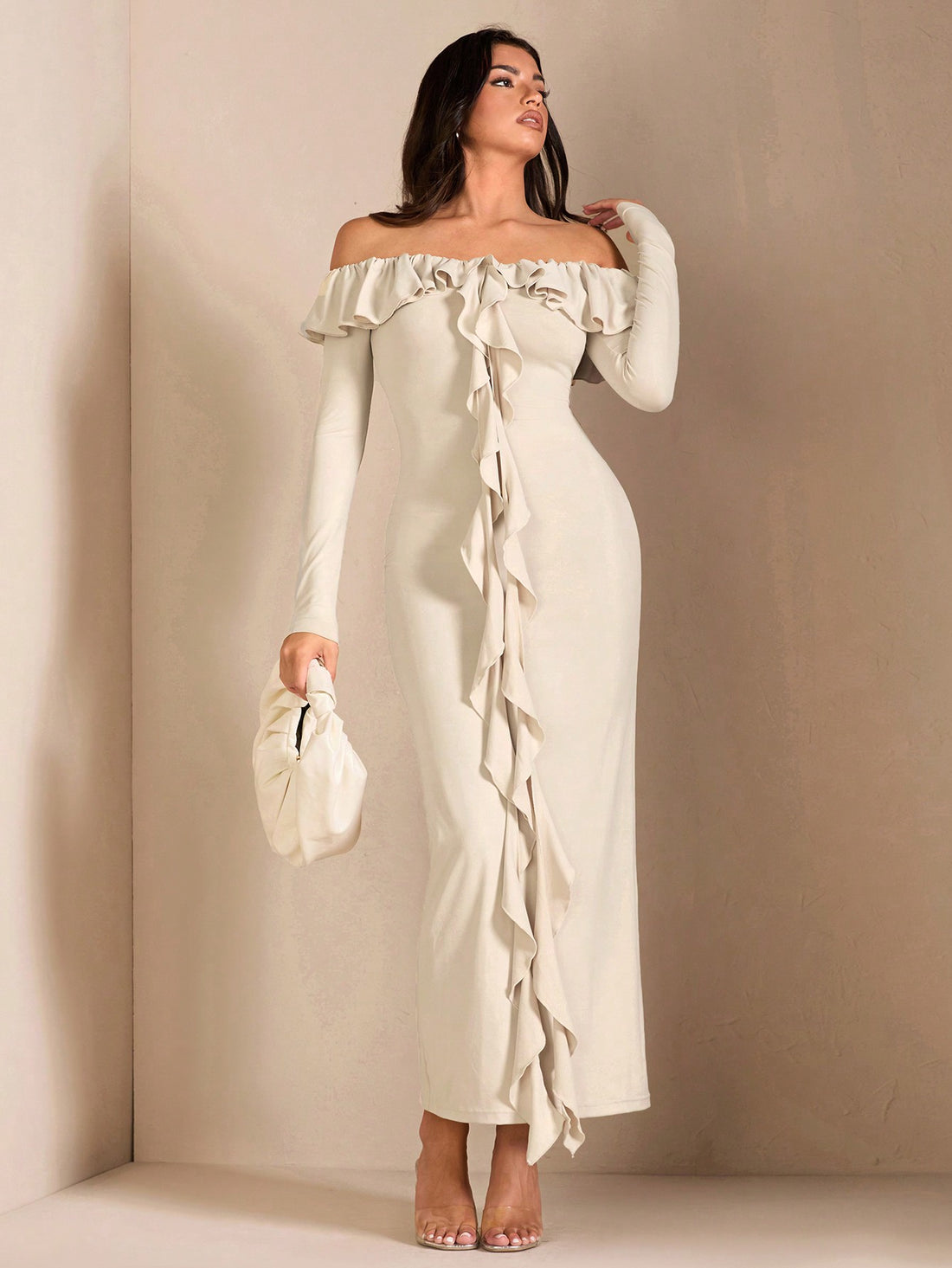 Get ready for a chic and flirty look with our Ruffled Off-Shoulder Dress for beach parties and romantic evenings. With its playful ruffles and alluring off-shoulder design, this dress is perfect for making a statement. Featuring long sleeves for versatility, it's the perfect addition to your wardrobe.