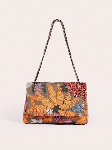 Perfect for parties and celebrations, the Chic Sequin & Embroidery Flower Chain Bag is a must-have accessory. Its intricate embroidery and sparkling sequins make a statement, while the sturdy chain allows for comfortable and secure carrying. Elevate your party look with this elegant and fashionable bag.