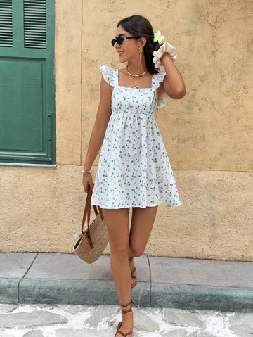 Elevate your warm-weather wardrobe with the Serisse Floral Mini Dress. This charming piece features a flattering square neckline and delicate bowknot detail that adds a touch of feminine elegance. The vibrant floral print brings effortless style to any occasion—from beachside getaways to casual brunches and vacation adventures.