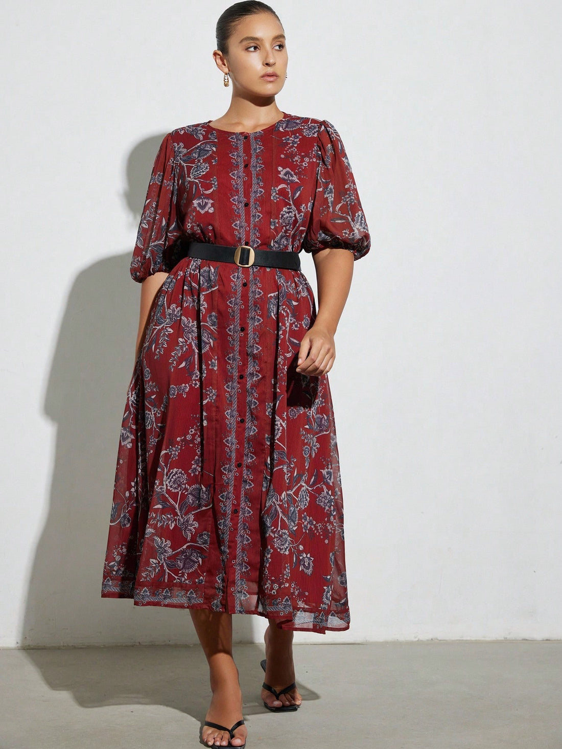 Step out in style with this playful short sleeve chiffon dress that flatters your figure with a chic waist-cinching design. The elegant print adds a touch of sophistication, making it perfect for both casual outings and special occasions. Lightweight and breezy, it keeps you comfortable while turning heads wherever you go.