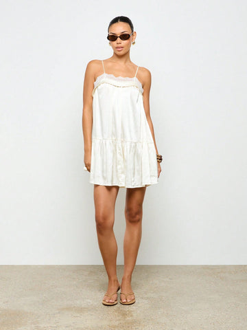 Turn heads effortlessly in this silky satin mini slip dress, featuring a flirty drop waist and delicate lace trim. Its lightweight, smooth fabric keeps you cool and comfy, making it your go-to for weddings, beach getaways, or laid-back summer parties. Embrace easy elegance with a playful twist!
