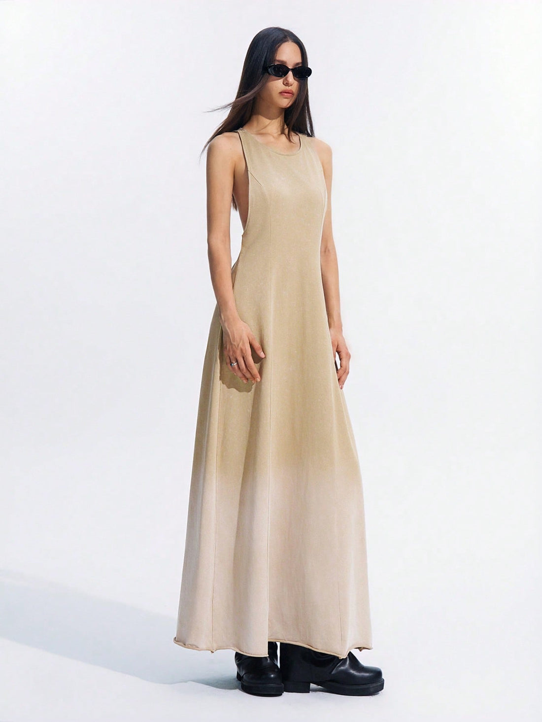 Step into effortless style with this chic sleeveless ombre midi dress. Featuring a casual round neck and a flattering gradient design, it’s perfect for sunny days and playful evenings. Lightweight and breezy, this dress moves with you, making every moment feel like a stylish adventure.