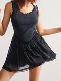 Step into summer with this playful sleeveless mini dress, featuring charming ruffle trims that add a flirty touch to your casual look. Its solid color makes it easy to mix and match, while the lightweight fabric keeps you cool and comfortable all day long. Perfect for sunny days and spontaneous adventures!