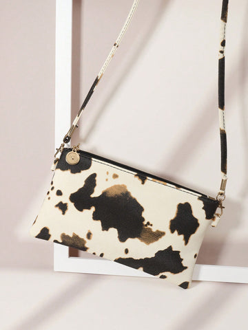 The Chic Snakeskin Grain Cross-Body Bag is the perfect accessory for any fashion-forward woman. With its stylish snakeskin grain and versatile cross-body design, this bag is both chic and functional. Give the gift of fashion to the special woman in your life.