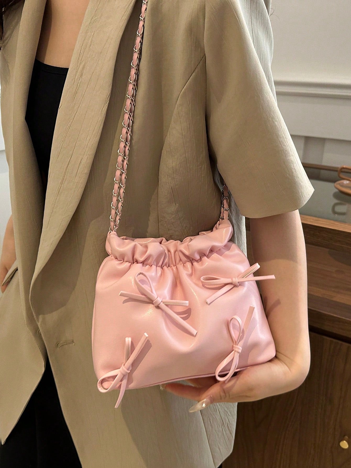 This chic shoulder bag features a solid color and stylish bowknot design, made with high-quality PU leather. Perfect for women and girls alike, this fashionable tote offers both functionality and elegance. Stay organized with its spacious interior and stand out with its sleek and modern look.