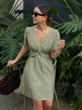 Step into summer with this playful short sundress featuring a chic solid color and a twist-cinched waist that flatters your figure effortlessly. Lightweight and breezy, it’s perfect for sunny days and spontaneous adventures, combining comfort with a stylish flair that keeps you looking fresh and fun all season long.