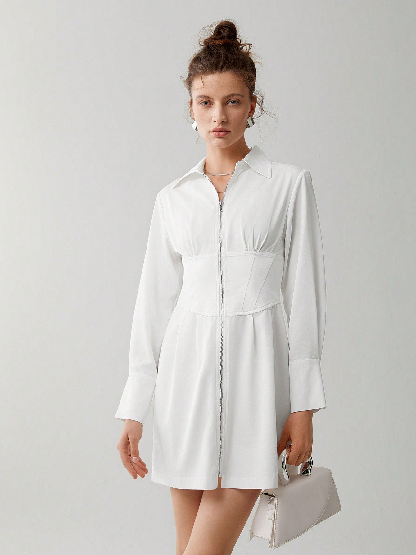Get ready to add some effortless style and comfort to your wardrobe with our Chic Solid Zip-Up Shirt Dress! This versatile dress features a zip-up design for a touch of chic, while still providing all-day comfort. Dress it up or down, this dress is the perfect addition to any wardrobe!