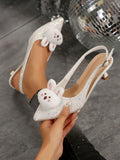 Elevate your style with Chic Sparkle: Trendy Pointed Toe High Heel Sandals. The sleek pointed toe and high heels add sophistication, while the adorable rabbit decor adds a playful touch. These sandals are perfect for any occasion, making you feel confident and stylish.